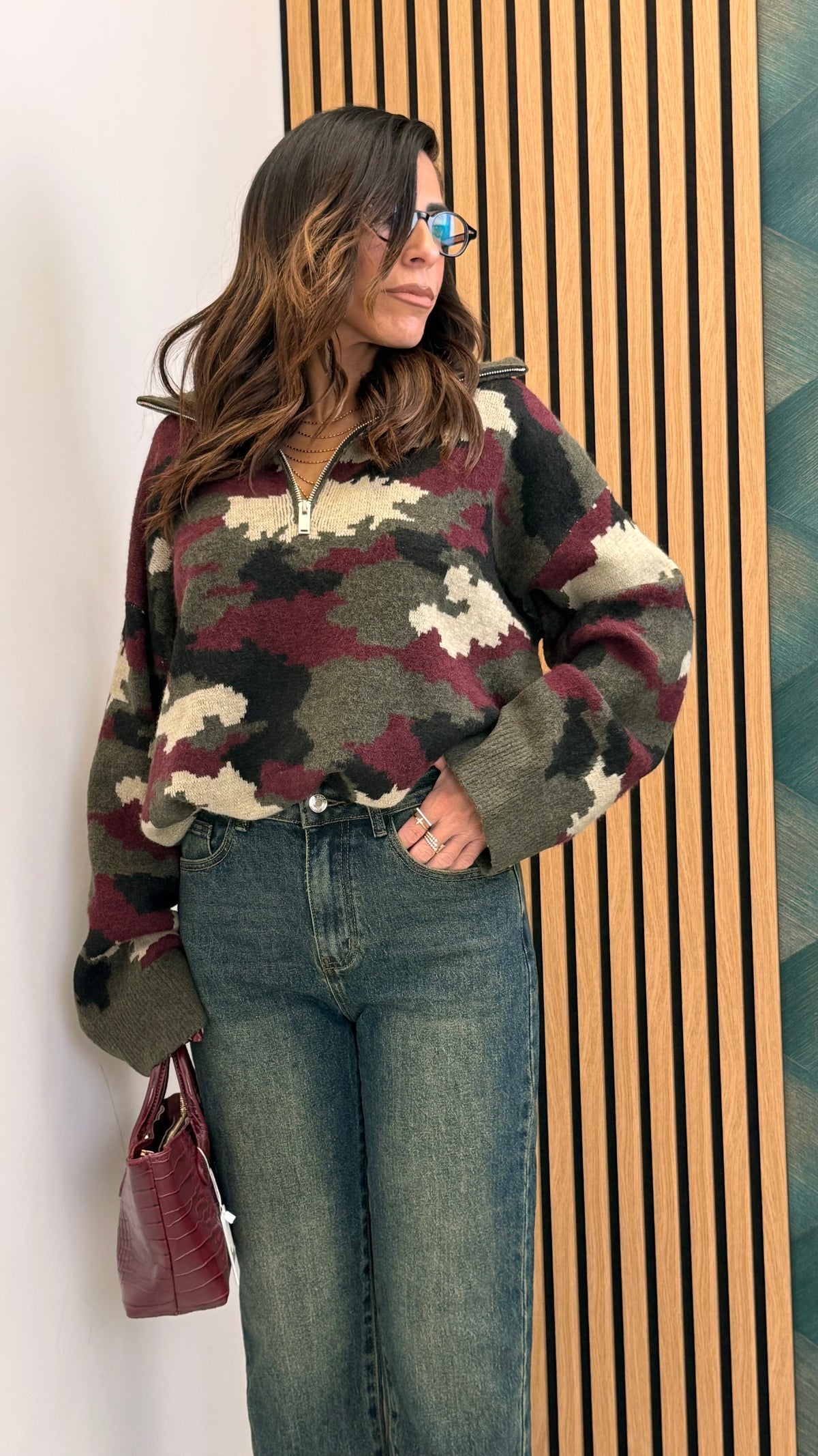 Pullover minetic con zip
