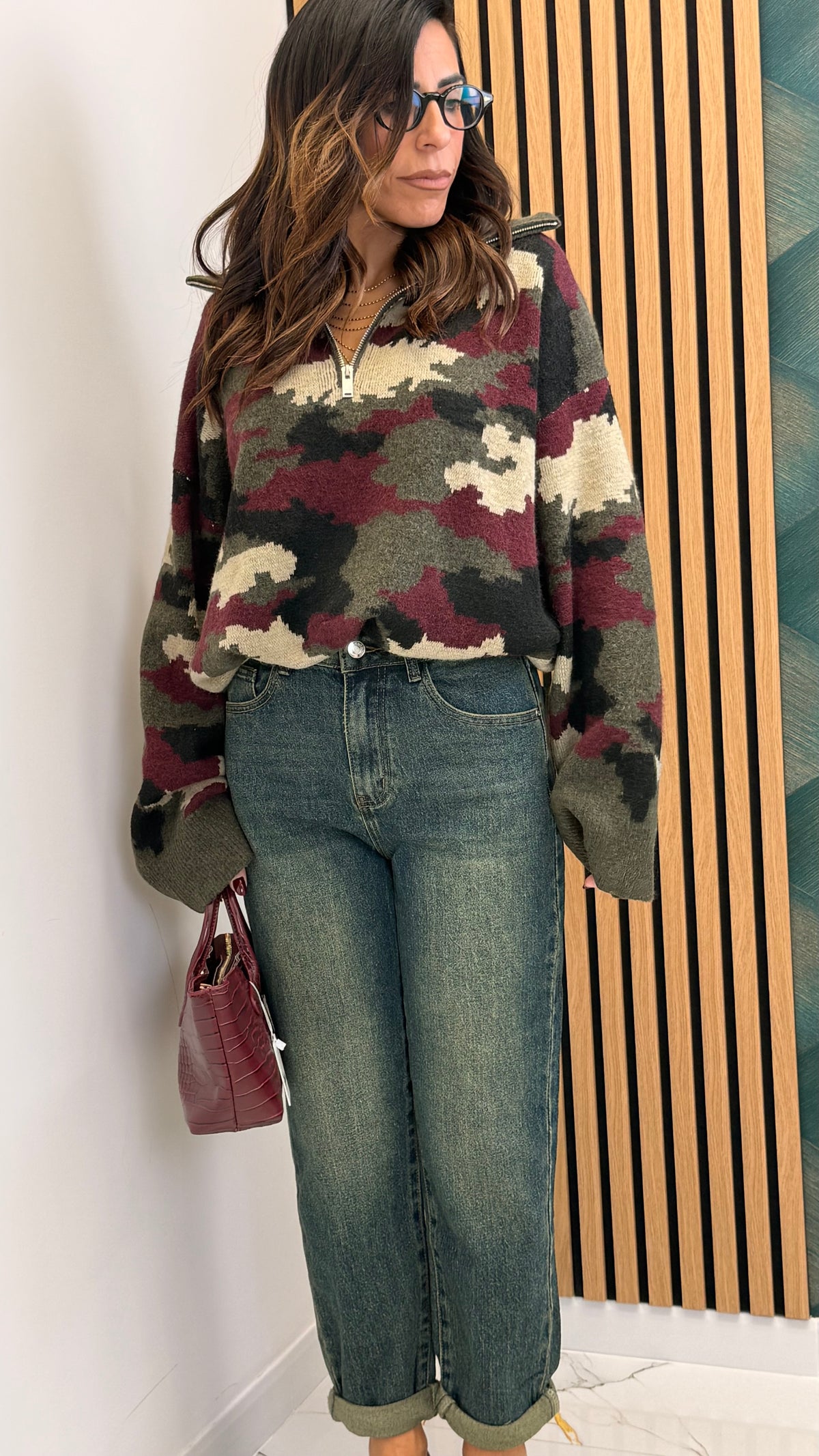 Pullover minetic con zip